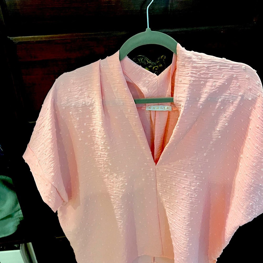 Karlie.  Light pink size large
